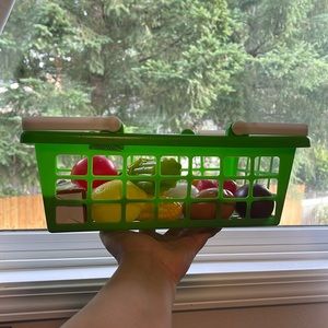 Kids grocery basket with food items